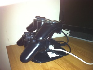 Side on photo of PS3 controller Docking station showing extra USB ports